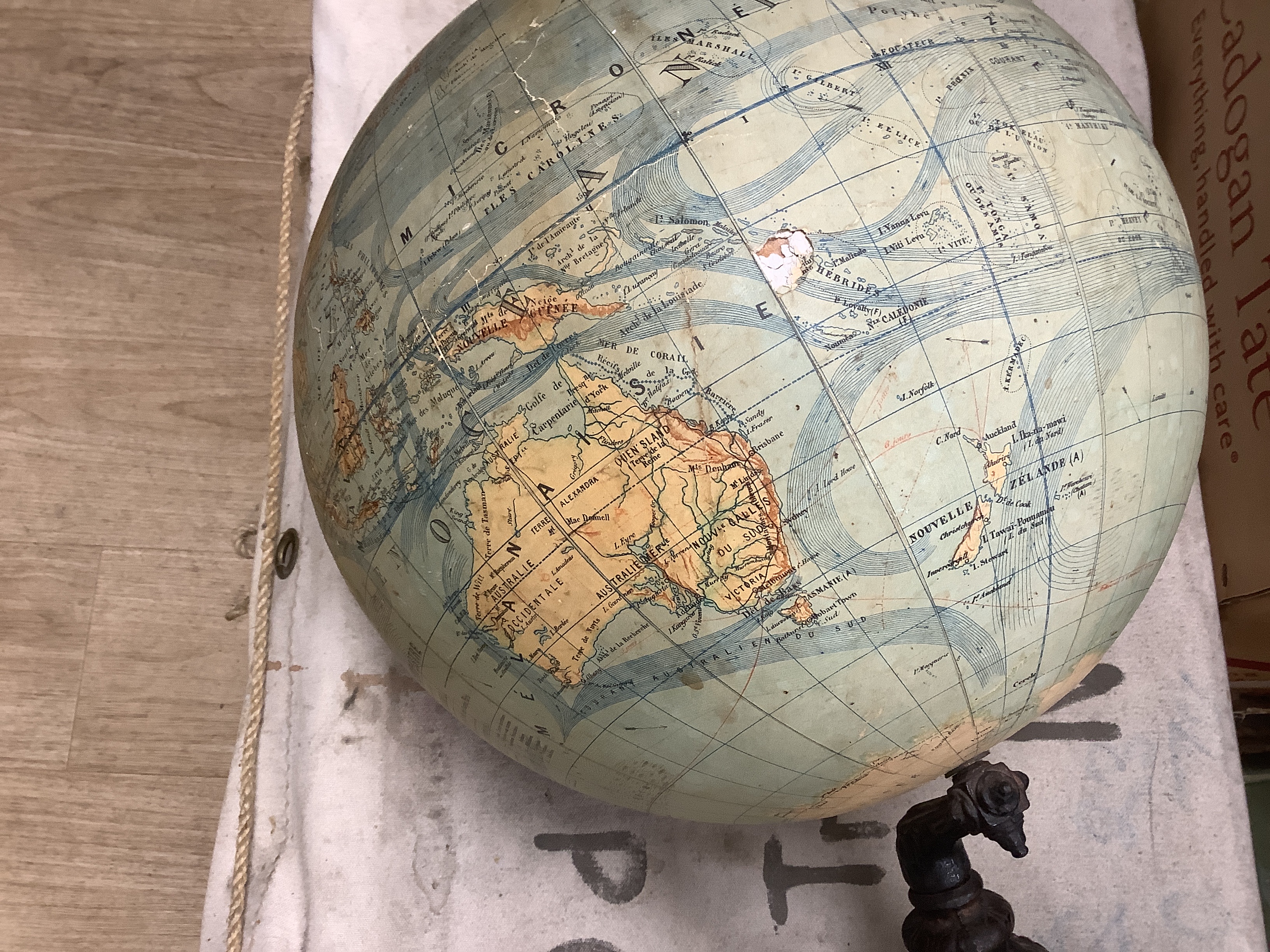 A French physical globe, on cast metal stand, c.1920, 60cm high (Petrograd 1914-24)